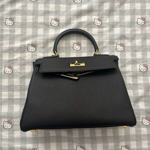 Black Leather Handbag with Gold Accents